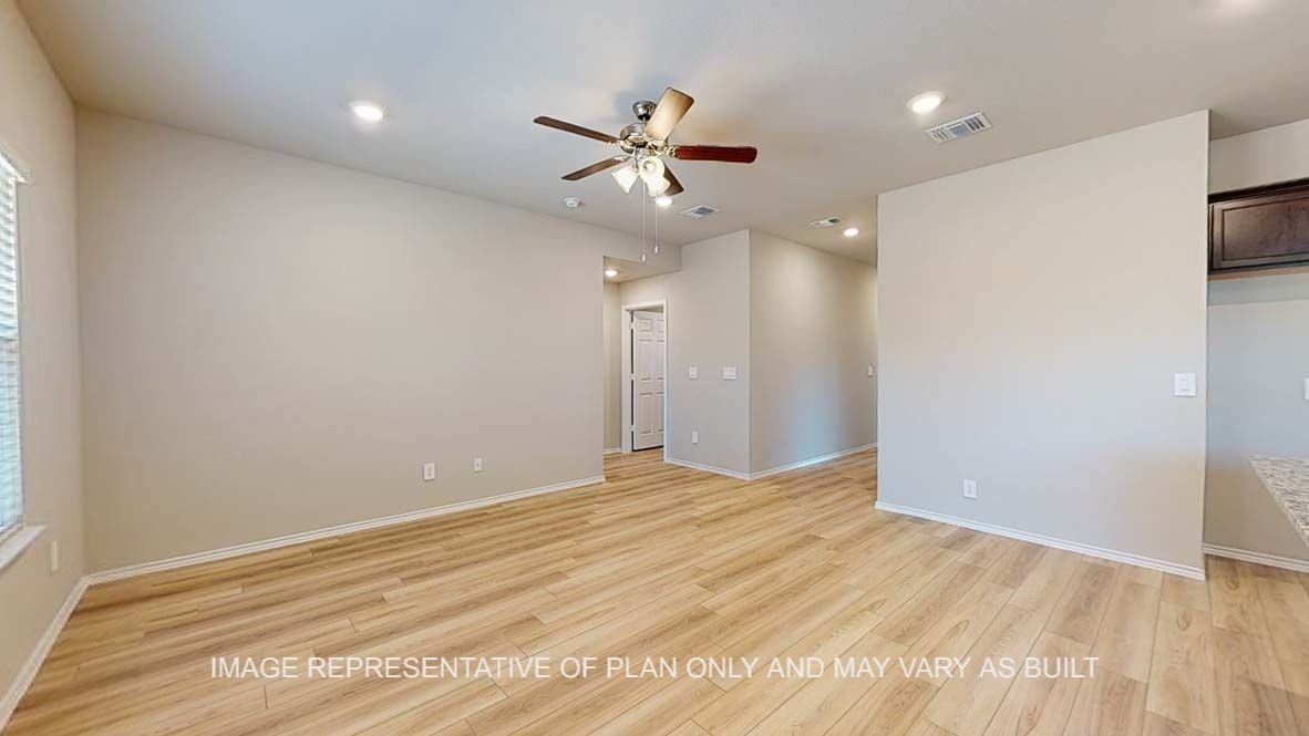 2805 Cyprian Road Lorena, TX 76655 - Photo 4 of 21 an empty room with fan and a ceiling fan