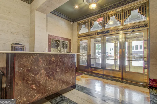 a bathroom with a sink a mirror and a shower
