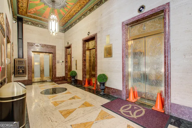 a stove top oven sitting inside of a kitchen