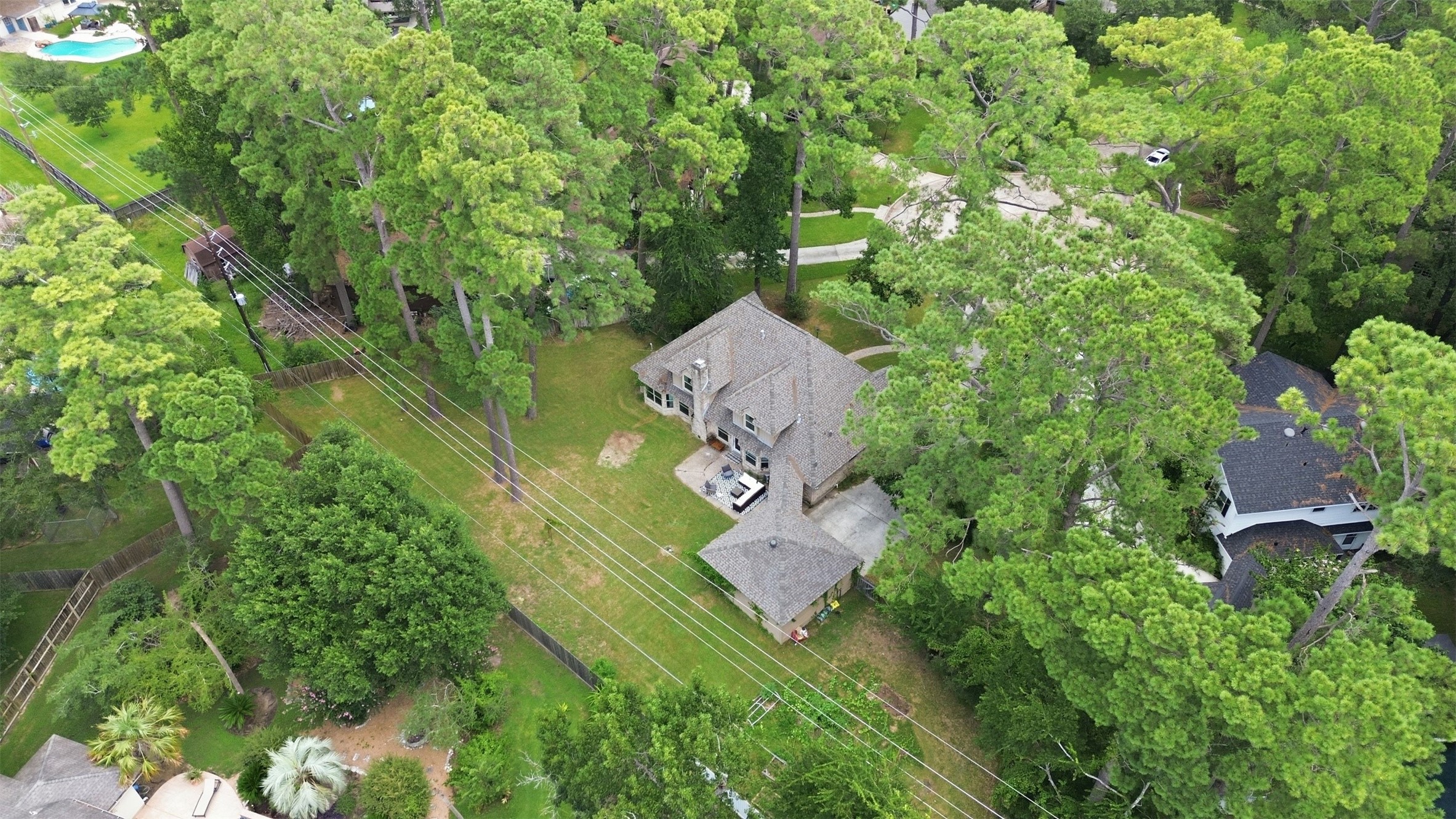 6518 Elmgrove Road Spring, TX 77389 - Photo 38 of 39 Aerial view showcasing the expansive, tree-filled lot with an impressive backyard and exceptional outdoor space.