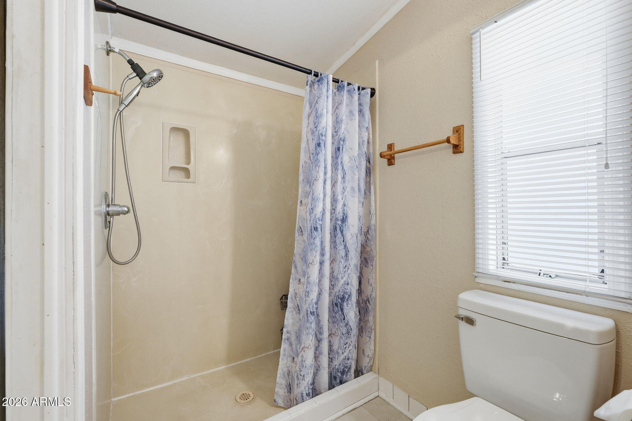 53 North Mountain Road, Unit 38 Apache Junction, AZ 85120 - Photo 23 of 35 a bathroom with a shower and a toilet