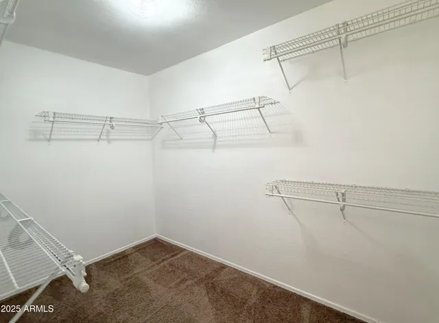 a view of a room with racks on the wall