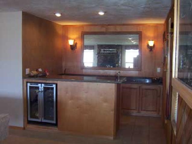 10107 Zier Road Yakima, WA 98908 - Photo 5 of 7 a bathroom with a granite countertop sink and a mirror