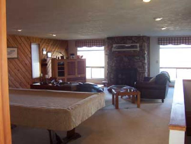 10107 Zier Road Yakima, WA 98908 - Photo 6 of 7 a living room with furniture and chandelier