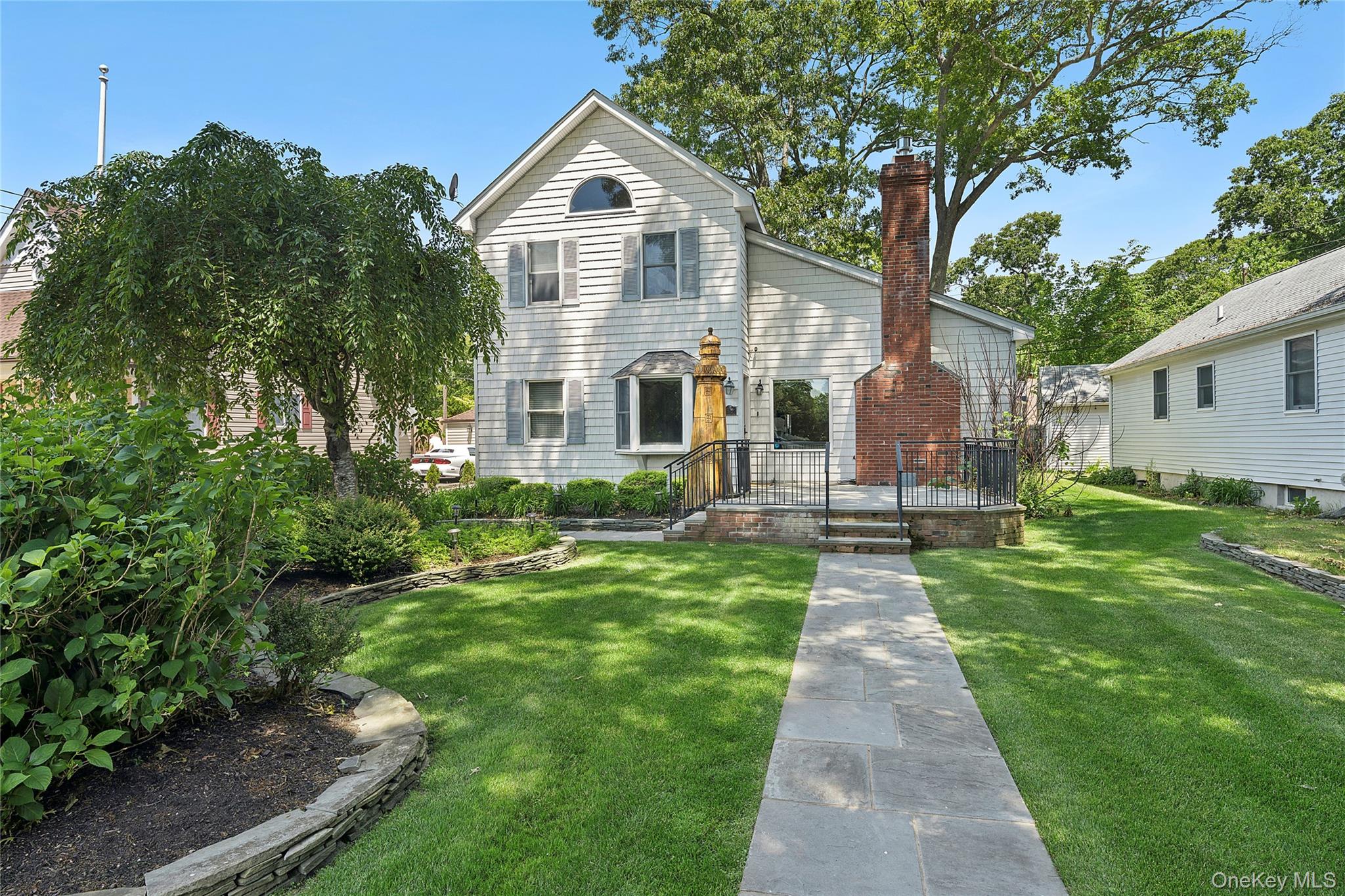 54 Breezy Point Road Wading River, NY 11792 - Photo 1 of 17 Curb appeal