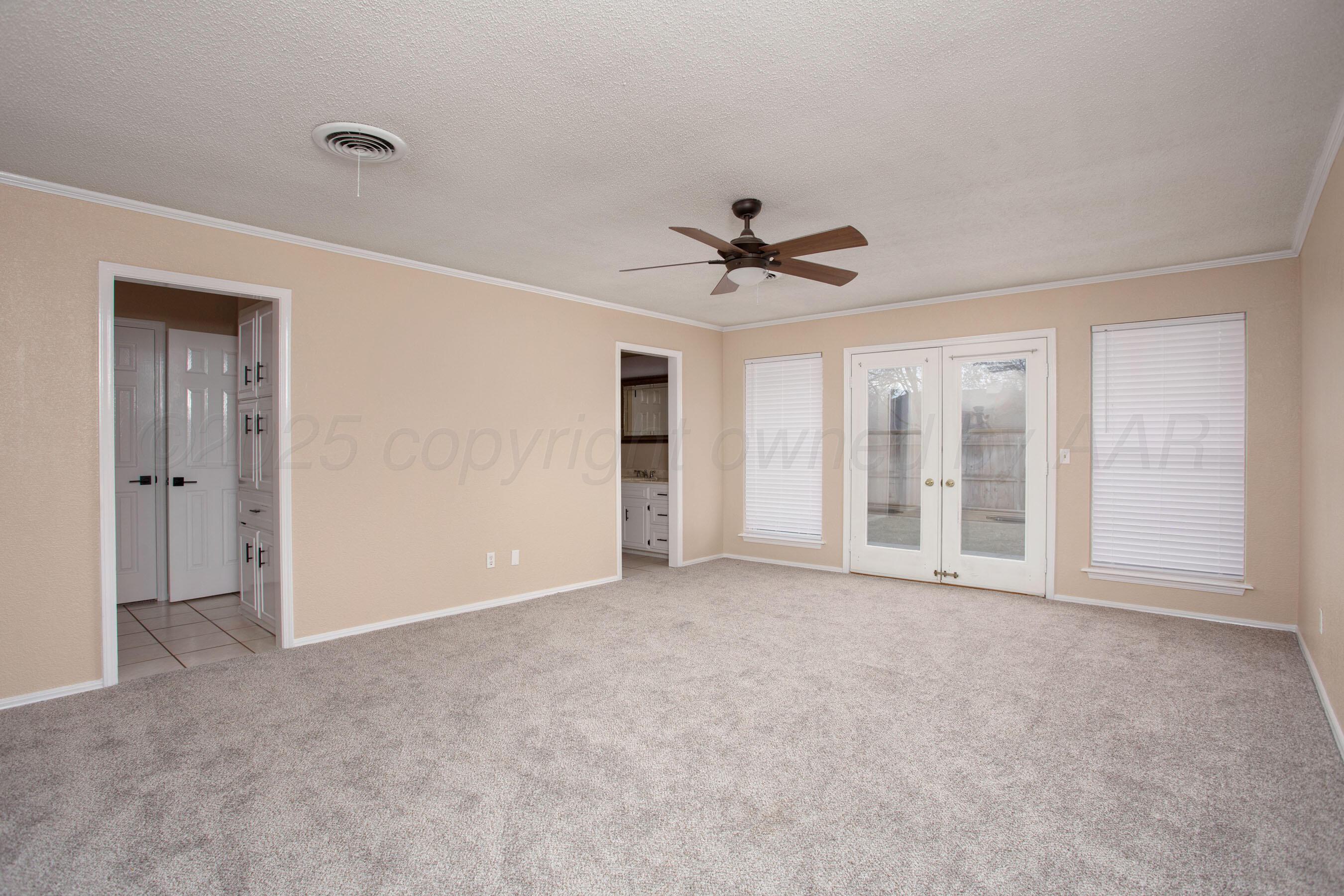 3529 Cinderella Lane Amarillo, TX 79121 - Photo 17 of 33 a view of an empty room with a window