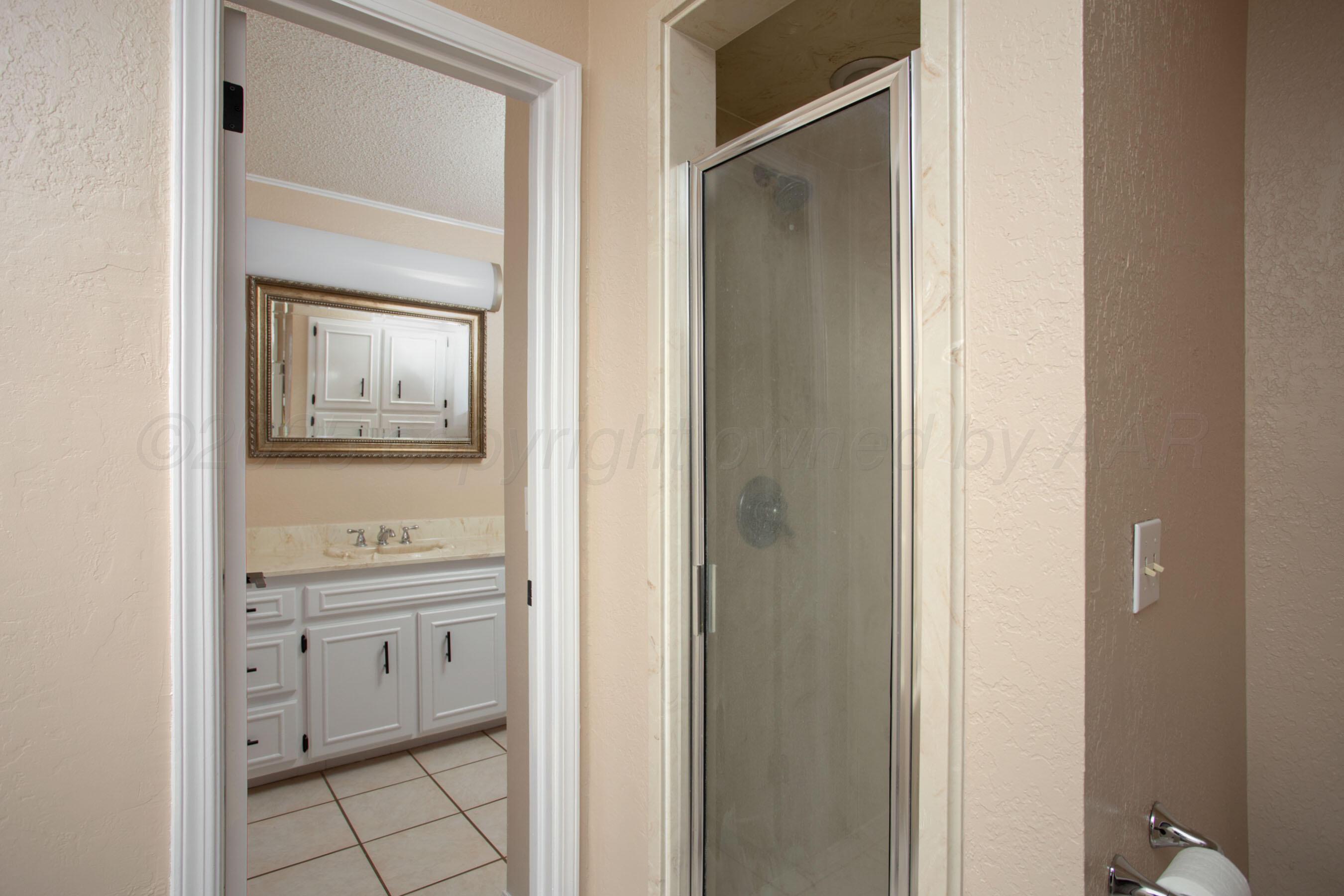 3529 Cinderella Lane Amarillo, TX 79121 - Photo 21 of 33 a view of a bathroom from the hallway