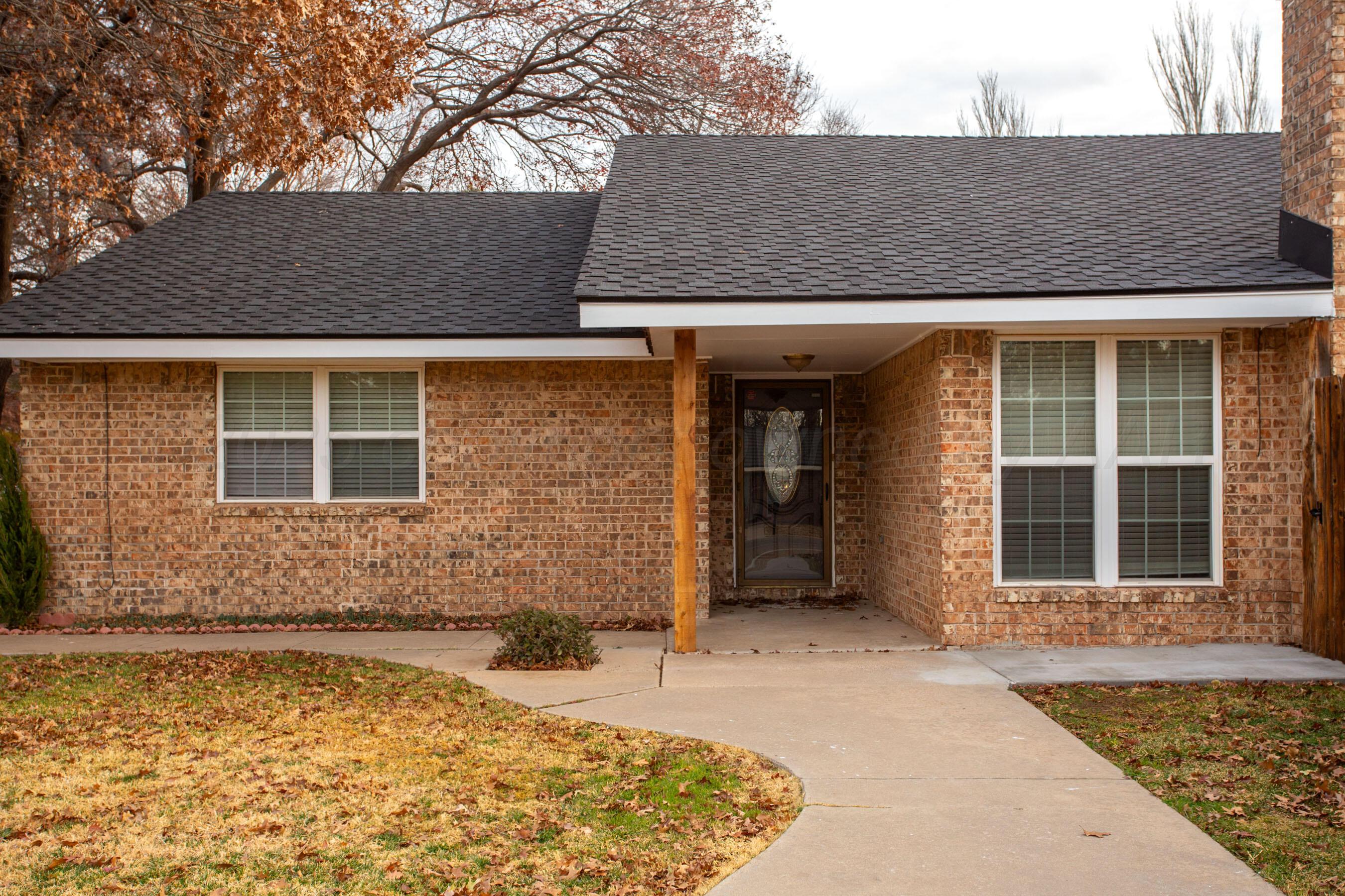 3529 Cinderella Lane Amarillo, TX 79121 - Photo 3 of 33 front view of a house with a yard