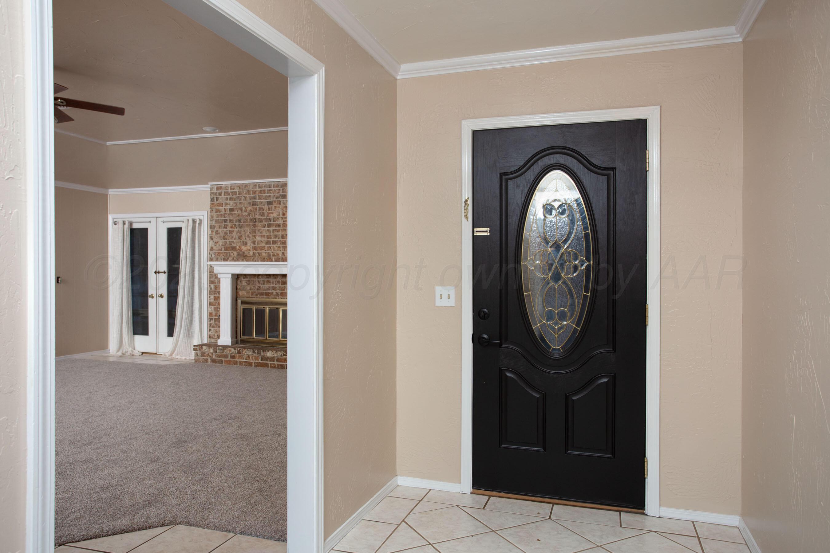 3529 Cinderella Lane Amarillo, TX 79121 - Photo 5 of 33 a view of a livingroom with wooden floor and a window