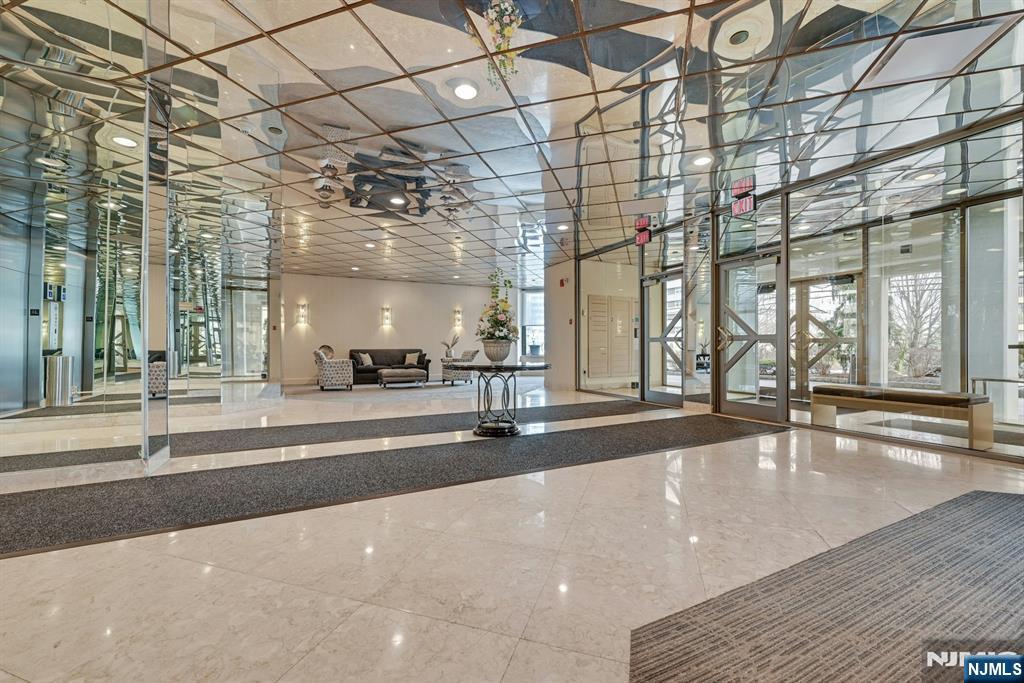 245 Prospect Avenue, Unit 12B Hackensack, NJ 07601 - Photo 26 of 33 a view of a building with a patio