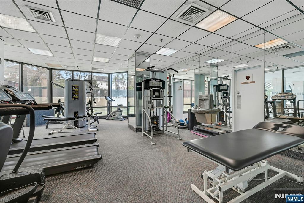245 Prospect Avenue, Unit 12B Hackensack, NJ 07601 - Photo 29 of 33 a room with gym equipment