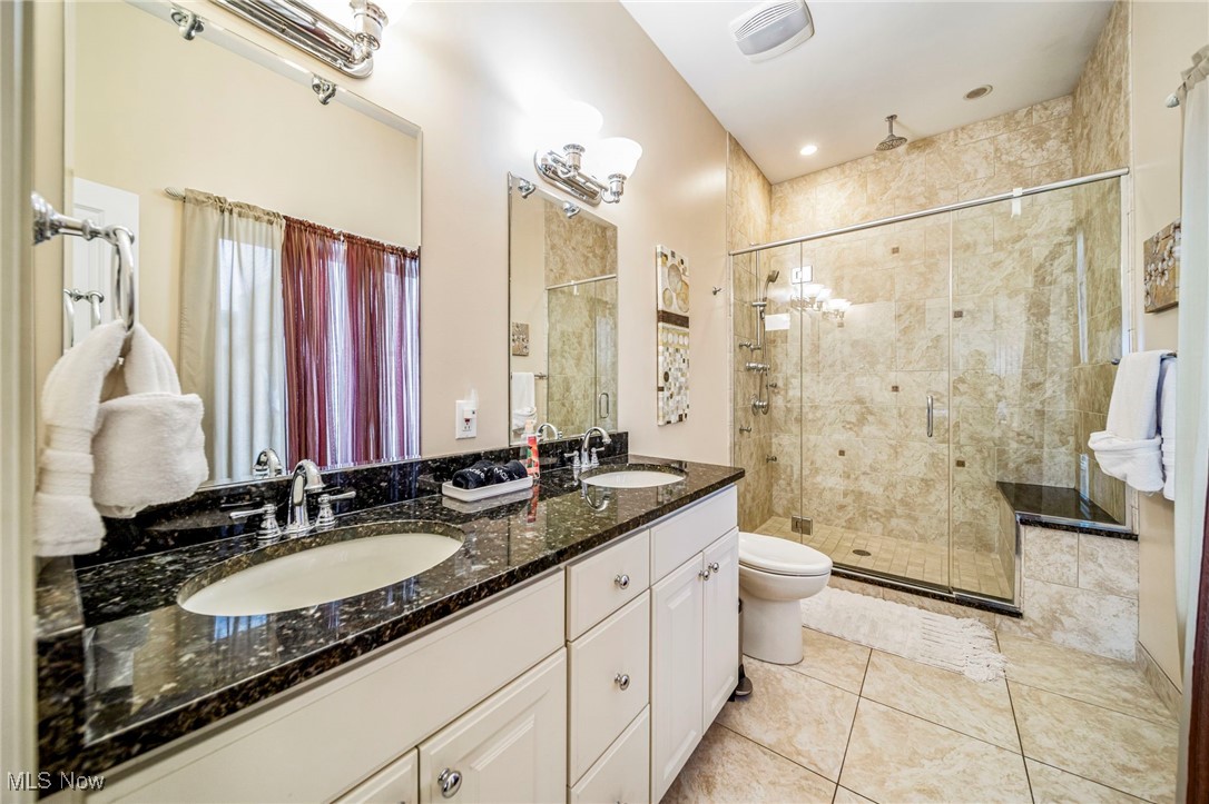 4699 Lake Road, Unit 401 Geneva, OH 44041 - Photo 27 of 36 walkin shower with rain head and body jets