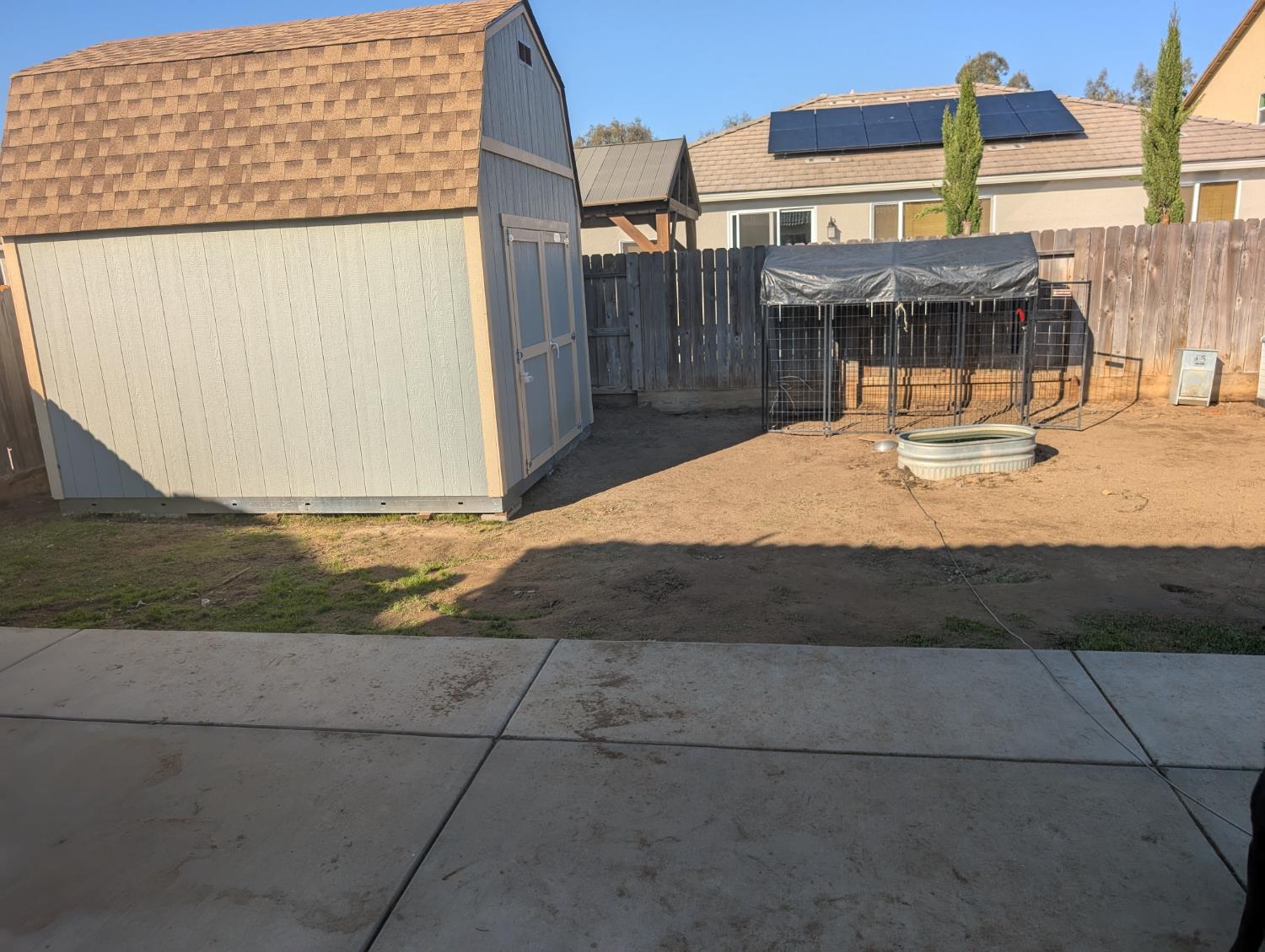 7226 East Normal Avenue Fresno, CA 93737 - Photo 3 of 4 a view of swimming pool with a yard