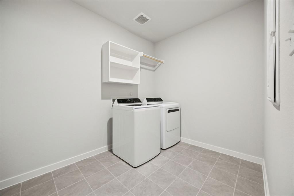 5721 Rushing River Way McKinney, TX 75071 - Photo 24 of 29 Utility Room in the Heisman home plan by Trophy Signature Homes – REPRESENTATIVE PHOTO