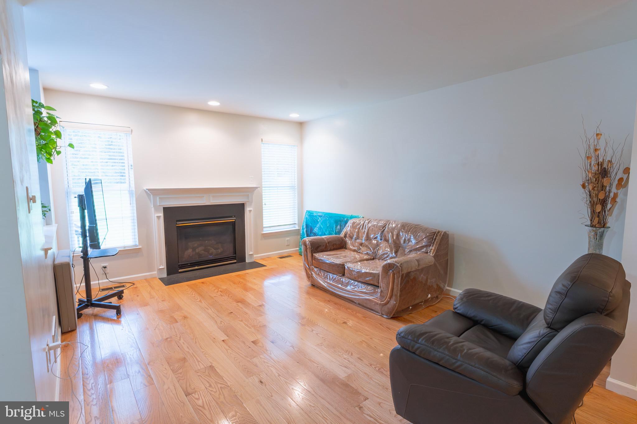 21 White Pine Gulch Reading, PA 19607 - Photo 8 of 35 a living room with furniture and a fireplace
