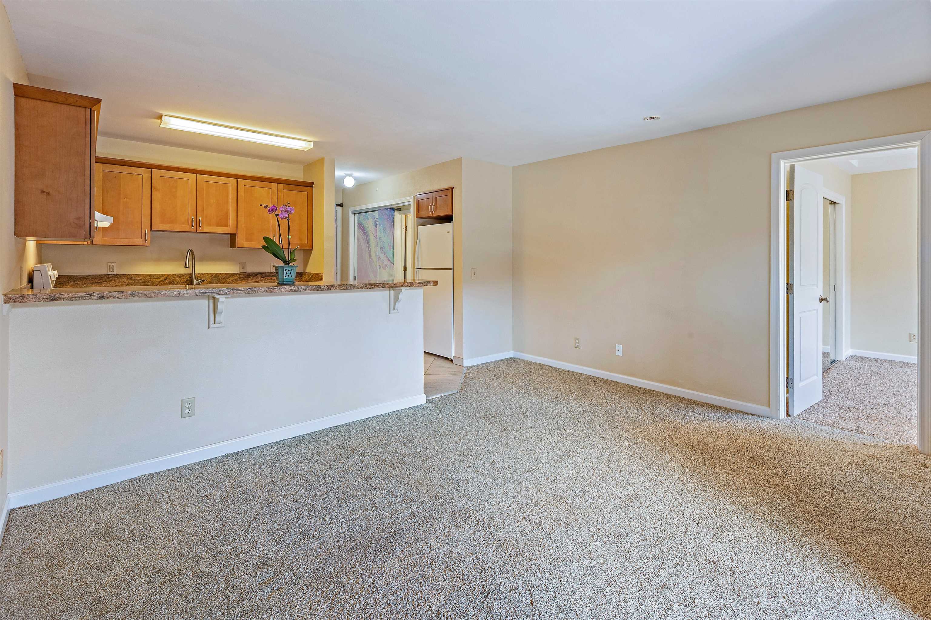 3740 Lower Honoapiilani Road, Unit D305 Lahaina, HI 96761 - Photo 13 of 32 a view of kitchen with wooden floor