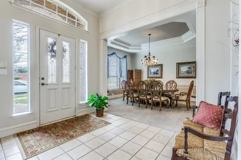 a view of a livingroom with furniture and window