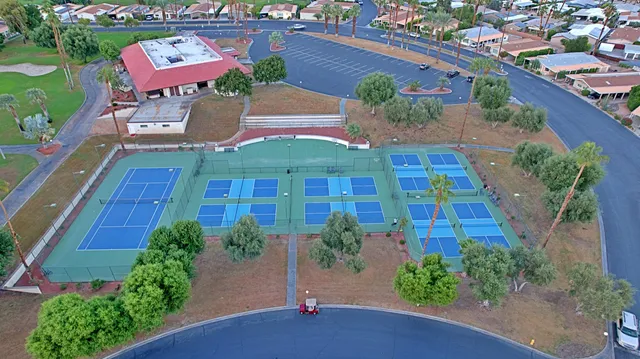 an aerial view of a house with a garden
