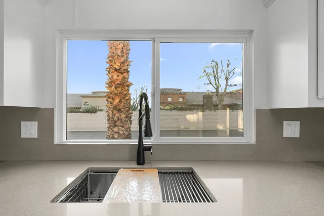 a view of a living room and window