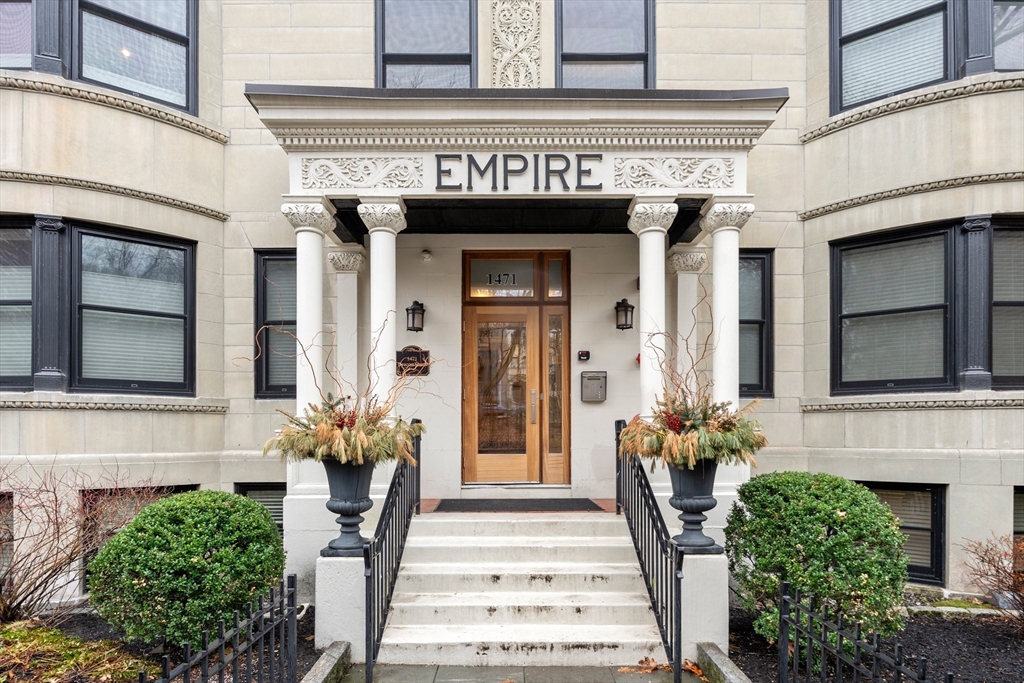 1471 Beacon Street, Unit 5 Brookline, MA 02446 - Photo 28 of 28 a front view of a house with potted plants