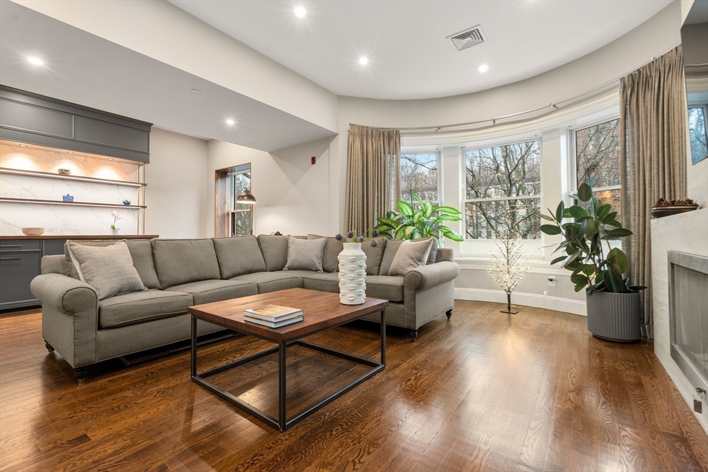 1471 Beacon Street, Unit 5 Brookline, MA 02446 - Photo 5 of 28 a living room with furniture and a potted plant