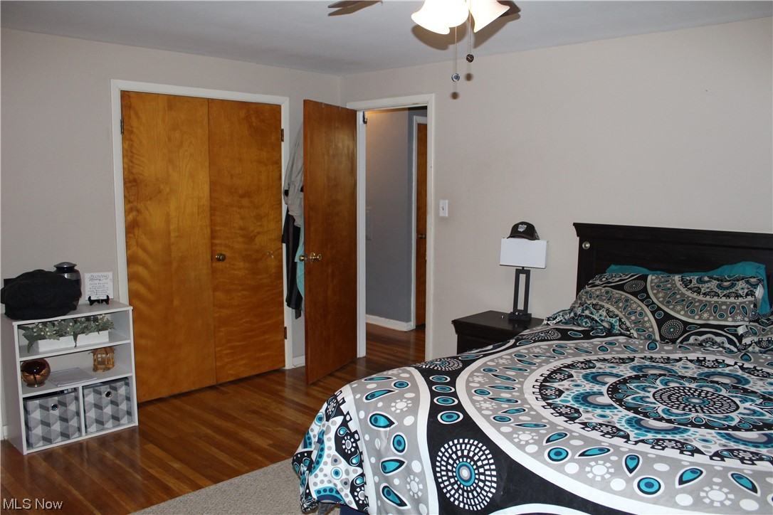 1292 Ford Road Lyndhurst, OH 44124 - Photo 11 of 25 Bedroom featuring hardwood floors, a closet, and ceiling fan