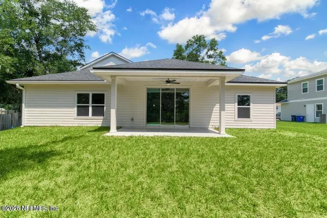 a stove top oven sitting inside of a kitchen
