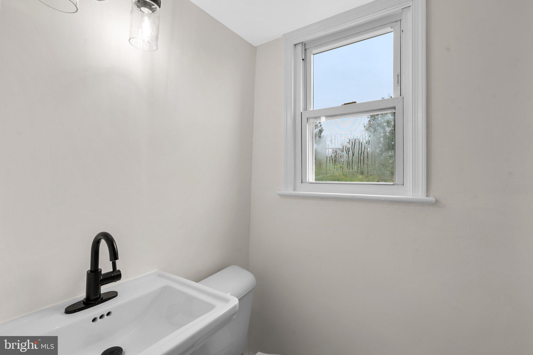 8303 Legation Road New Carrollton, MD 20784 - Photo 15 of 33 Primary Bath