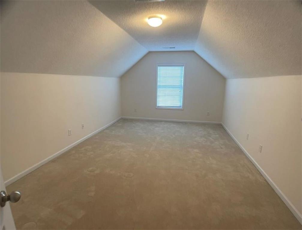 1281 Key Manor Lane Lawrenceville, GA 30045 - Photo 18 of 22 an empty room with a window
