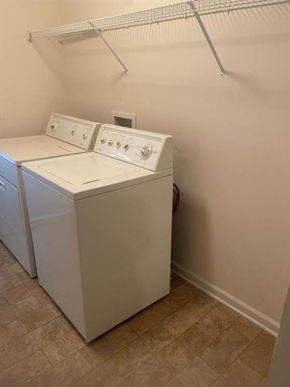 1281 Key Manor Lane Lawrenceville, GA 30045 - Photo 19 of 22 a utility room with dryer and washer