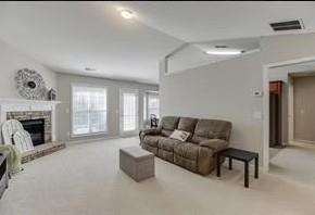 1281 Key Manor Lane Lawrenceville, GA 30045 - Photo 4 of 22 a living room with furniture and a fireplace