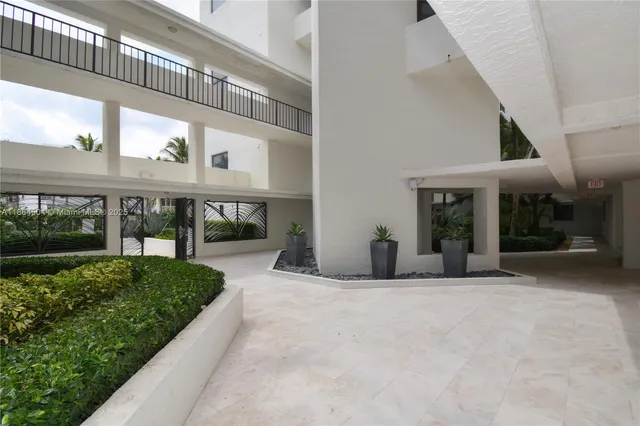 a view of a building with a porch