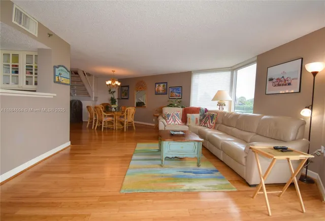 a view of a terrace with a palm tree
