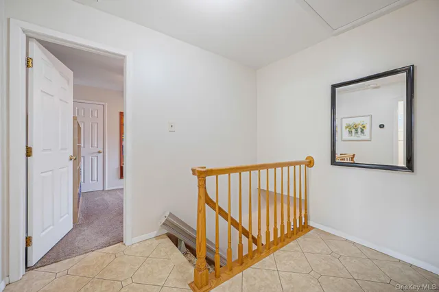 a view of a hallway with entryway