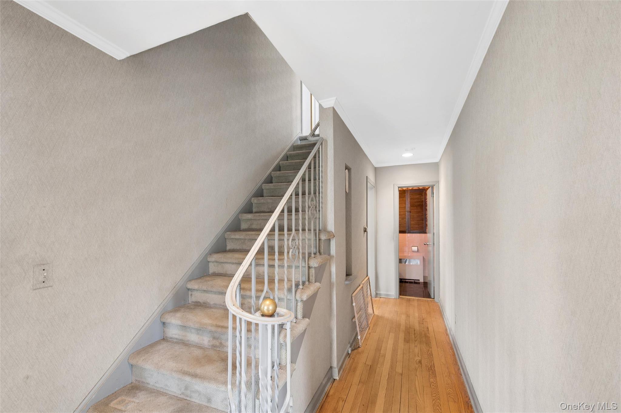 24 Allen Road Rockville Centre, NY 11570 - Photo 19 of 46 a view of a hallway with wooden floor and entryway