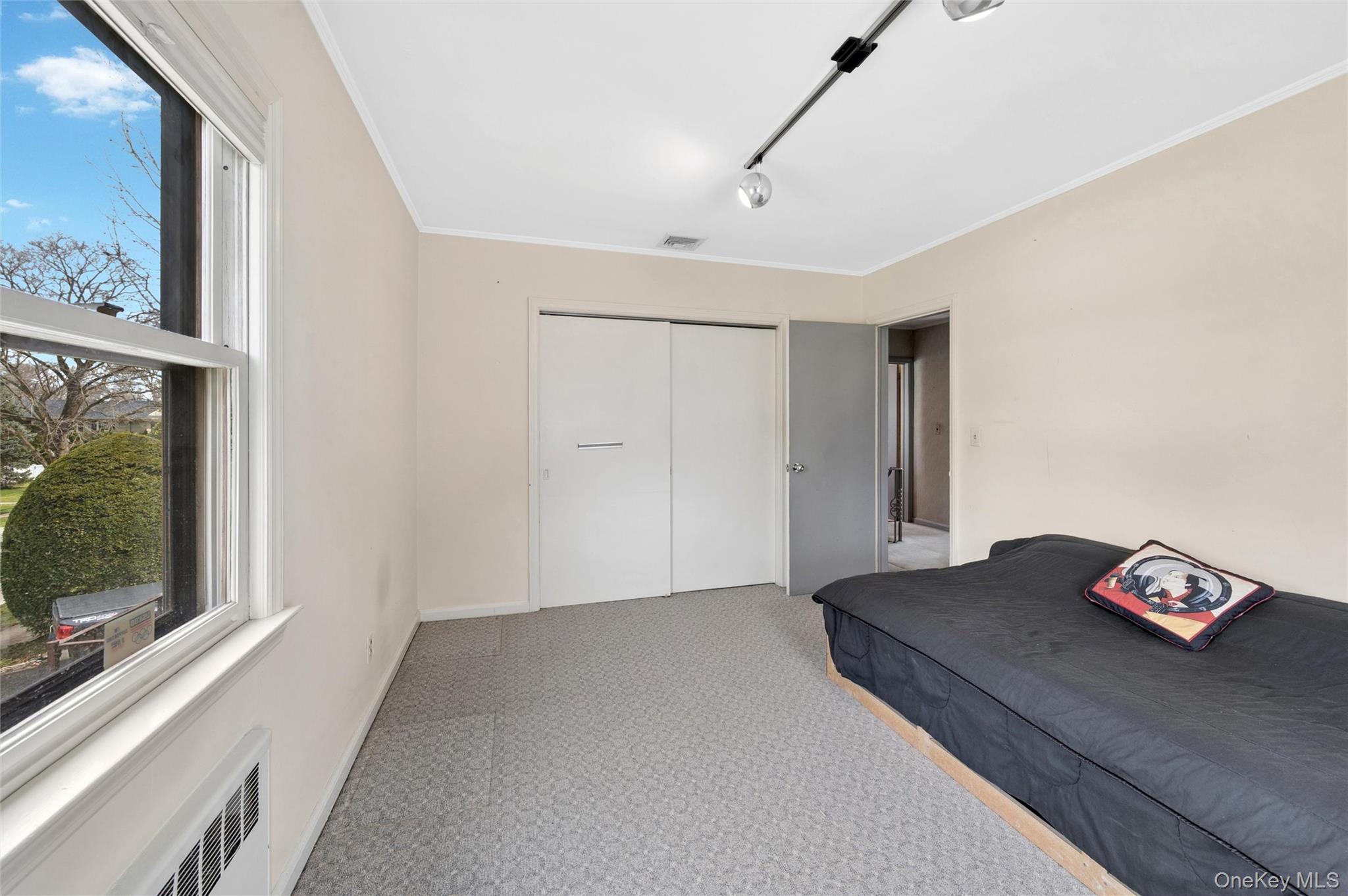 24 Allen Road Rockville Centre, NY 11570 - Photo 33 of 46 a view of livingroom with floor to ceiling window