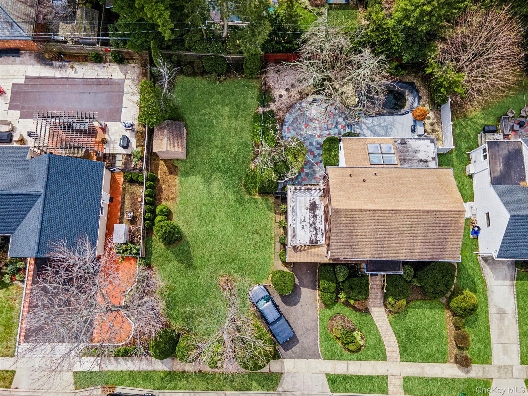 24 Allen Road Rockville Centre, NY 11570 - Photo 41 of 46 an aerial view of a house with a yard basket ball court and outdoor seating