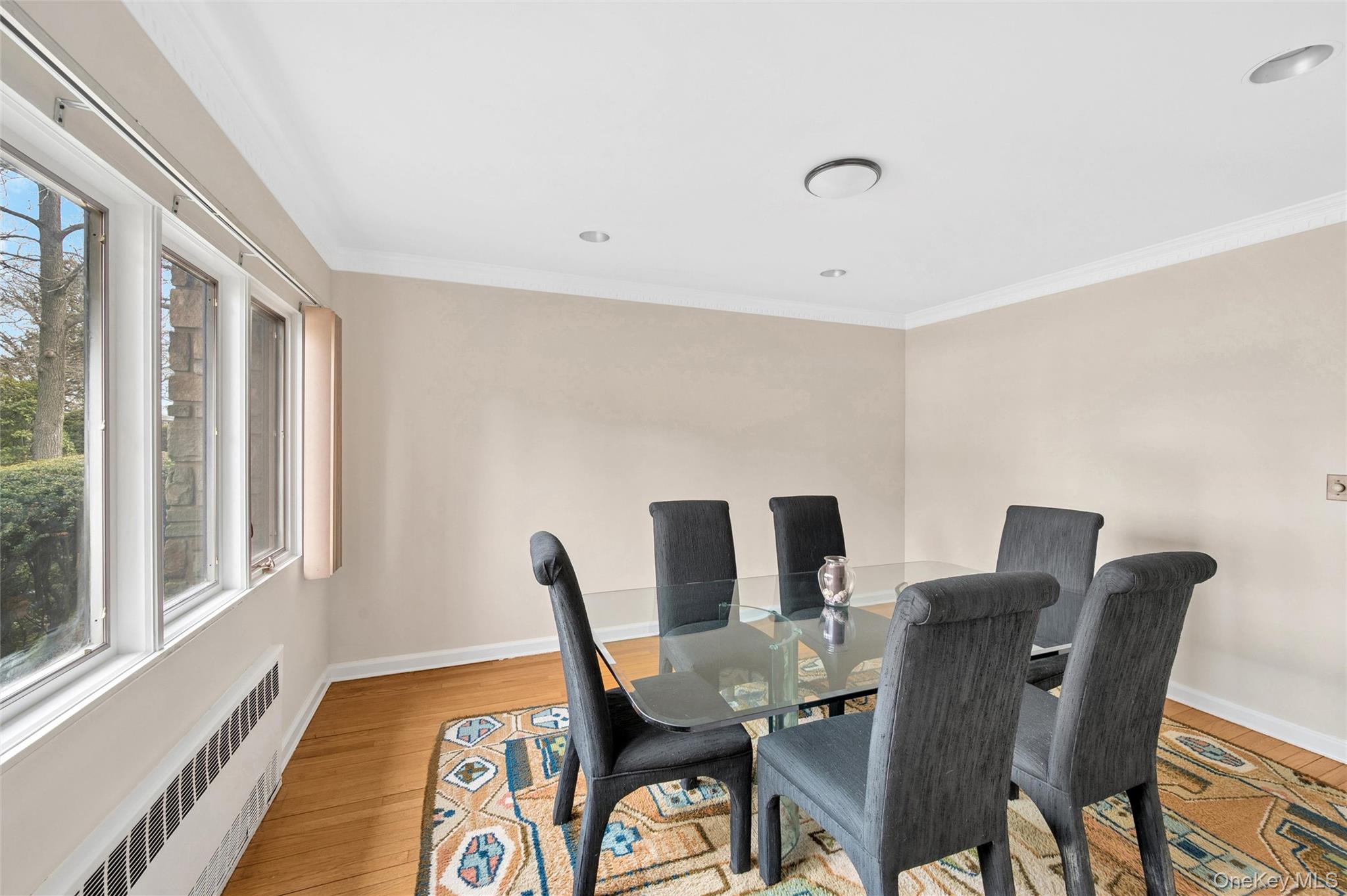 24 Allen Road Rockville Centre, NY 11570 - Photo 8 of 46 a view of a dining room with furniture window and wooden floor