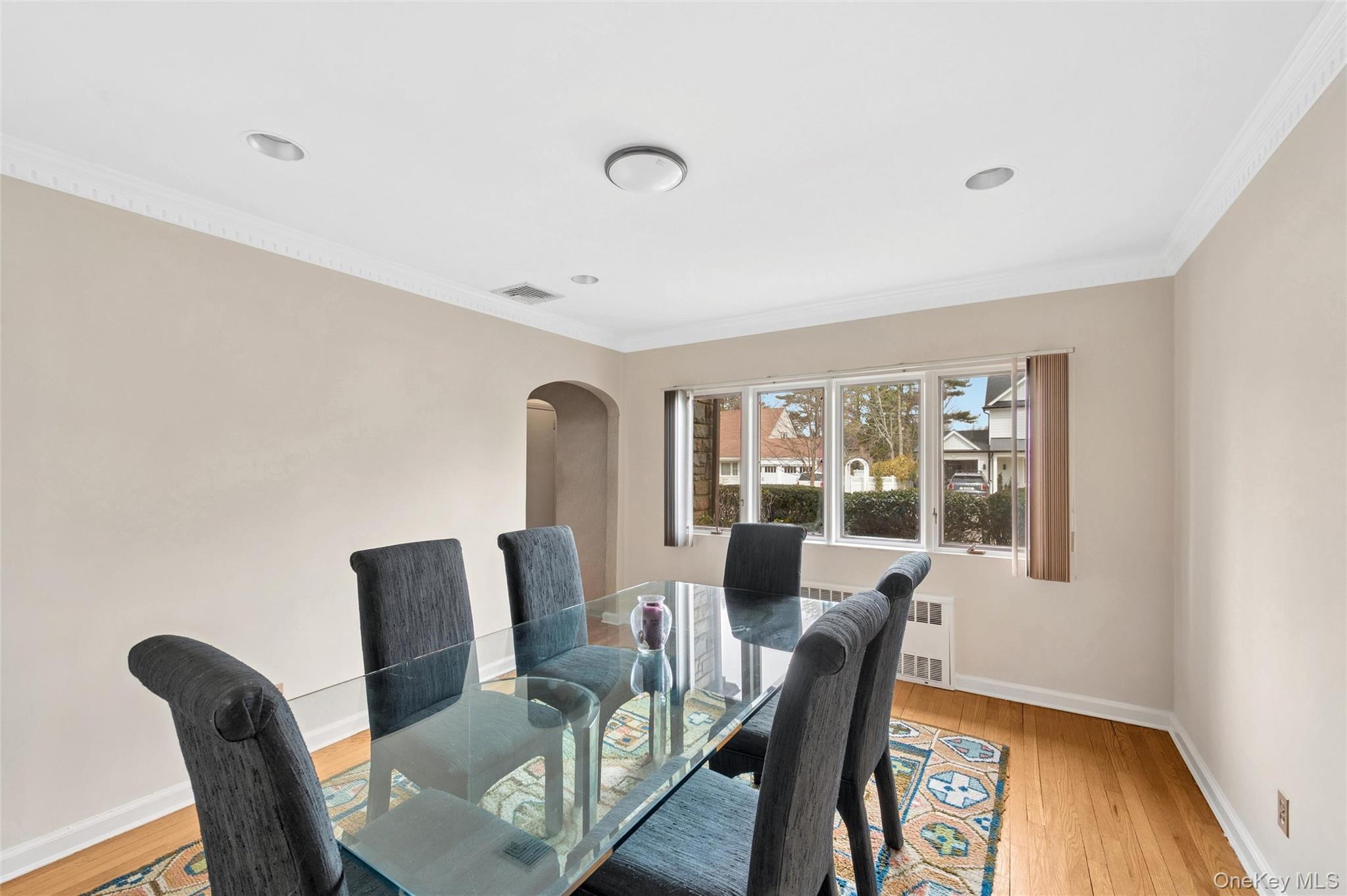 24 Allen Road Rockville Centre, NY 11570 - Photo 9 of 46 a view of a dining room with furniture window and wooden floor