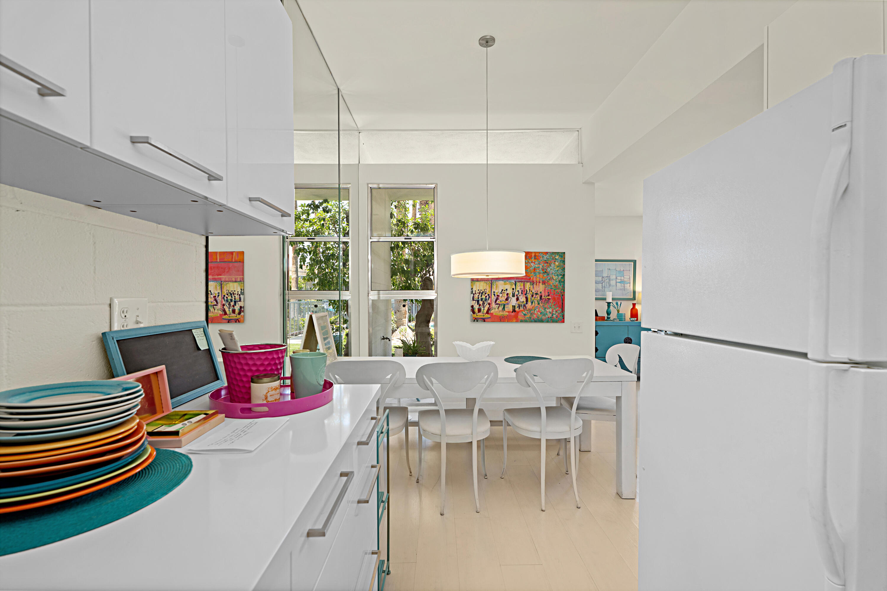 45301 Deep Canyon Road, Unit 21 Palm Desert, CA 92260 - Photo 14 of 46 a living room with furniture and a chandelier