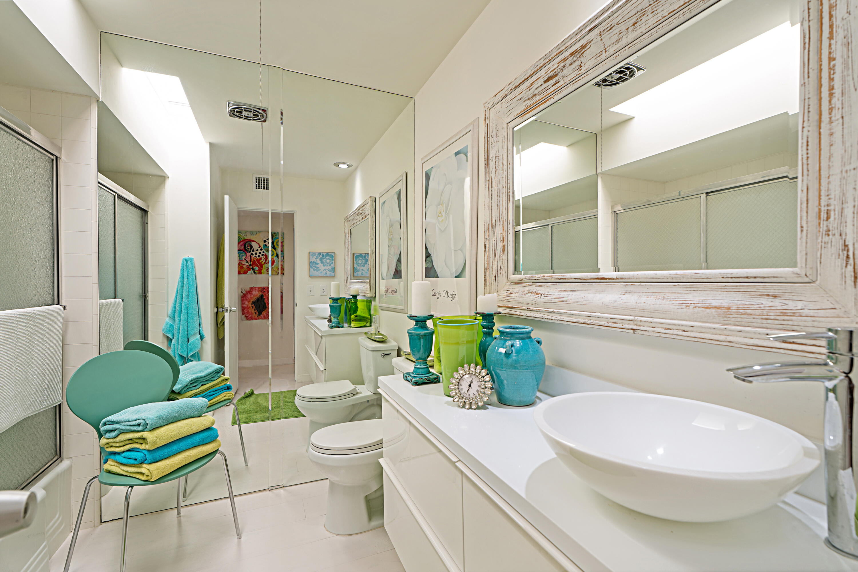 45301 Deep Canyon Road, Unit 21 Palm Desert, CA 92260 - Photo 15 of 46 a bathroom with a granite countertop toilet and a sink