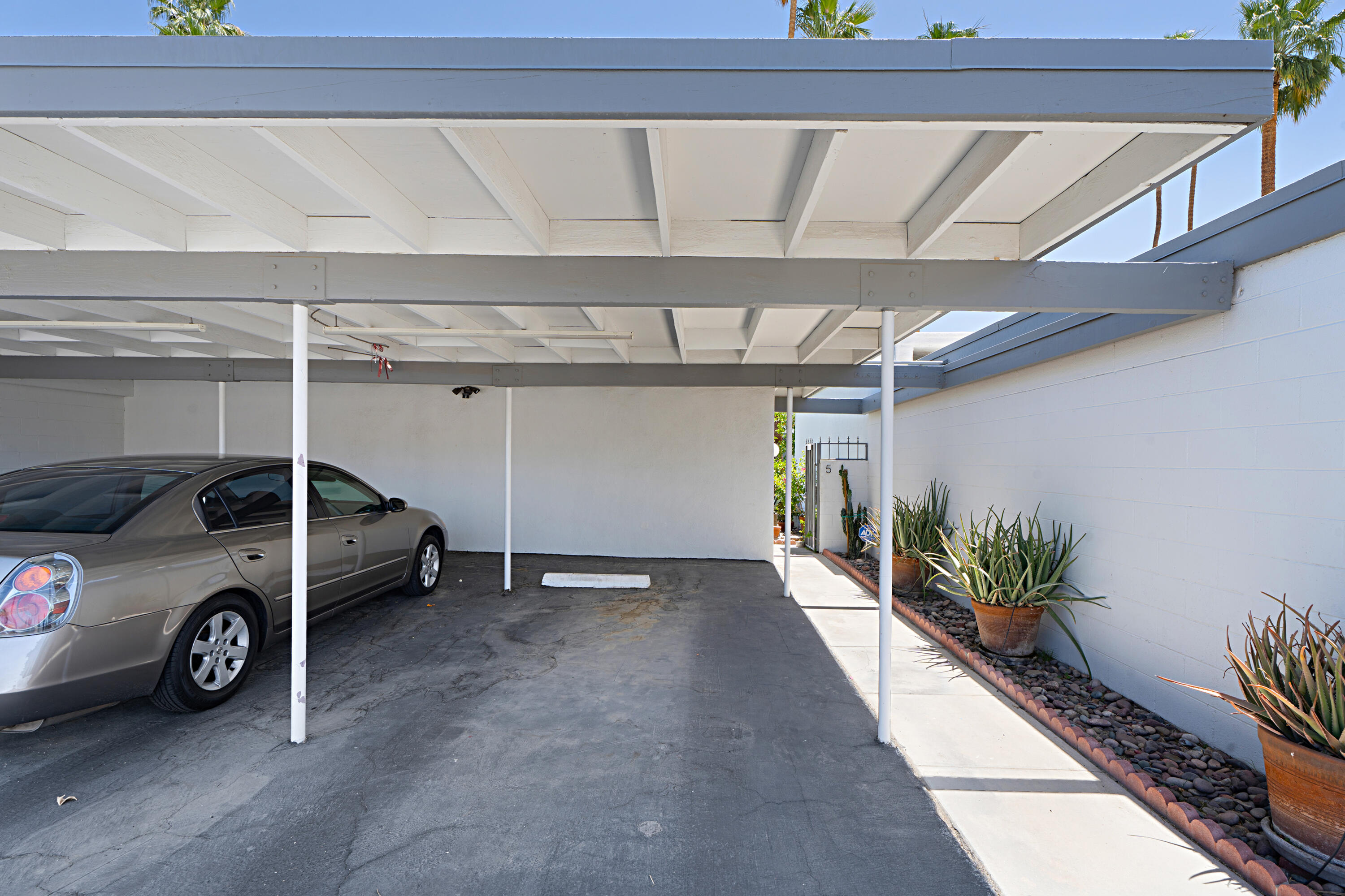 45301 Deep Canyon Road, Unit 21 Palm Desert, CA 92260 - Photo 46 of 46 a car parked in garage