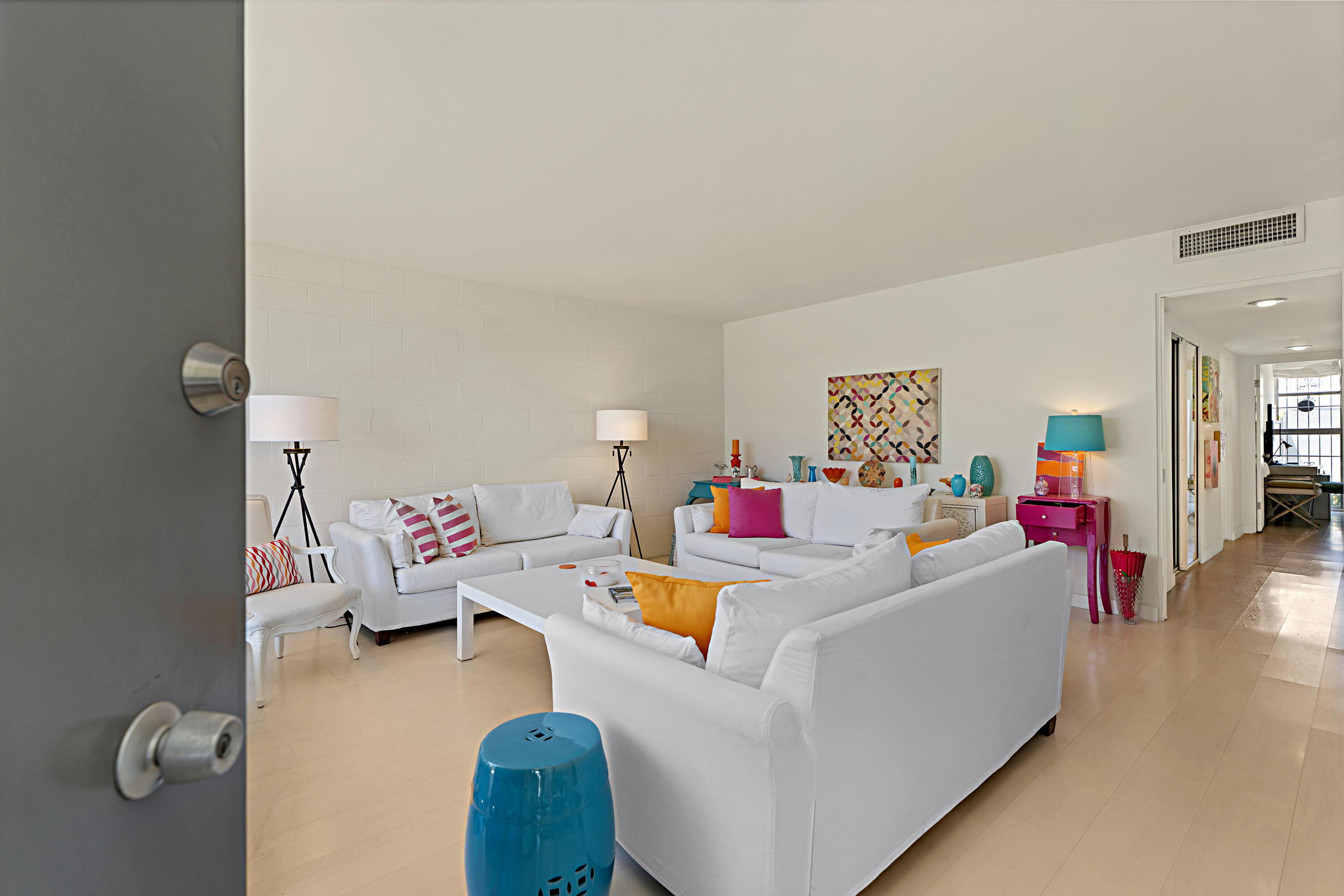 45301 Deep Canyon Road, Unit 21 Palm Desert, CA 92260 - Photo 6 of 46 a living room with furniture and a table