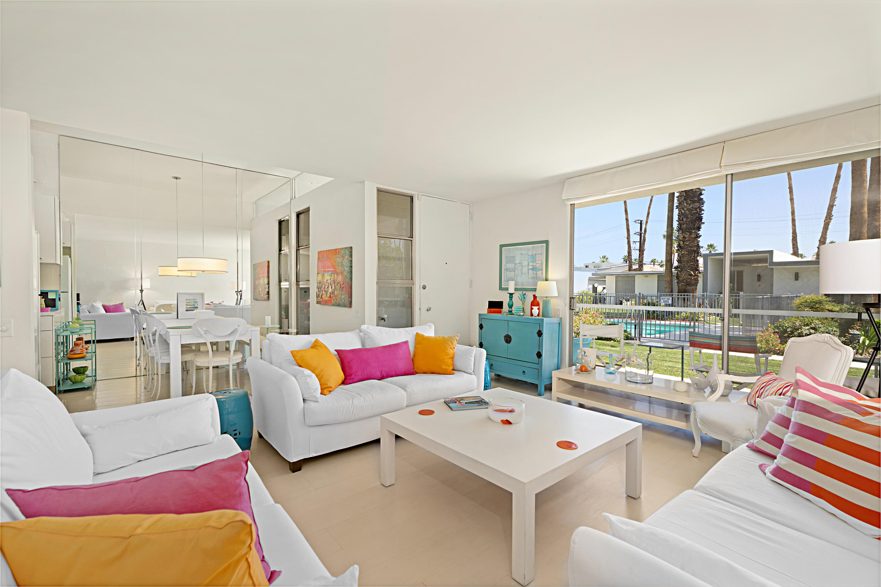 45301 Deep Canyon Road, Unit 21 Palm Desert, CA 92260 - Photo 9 of 46 a living room with furniture and a table
