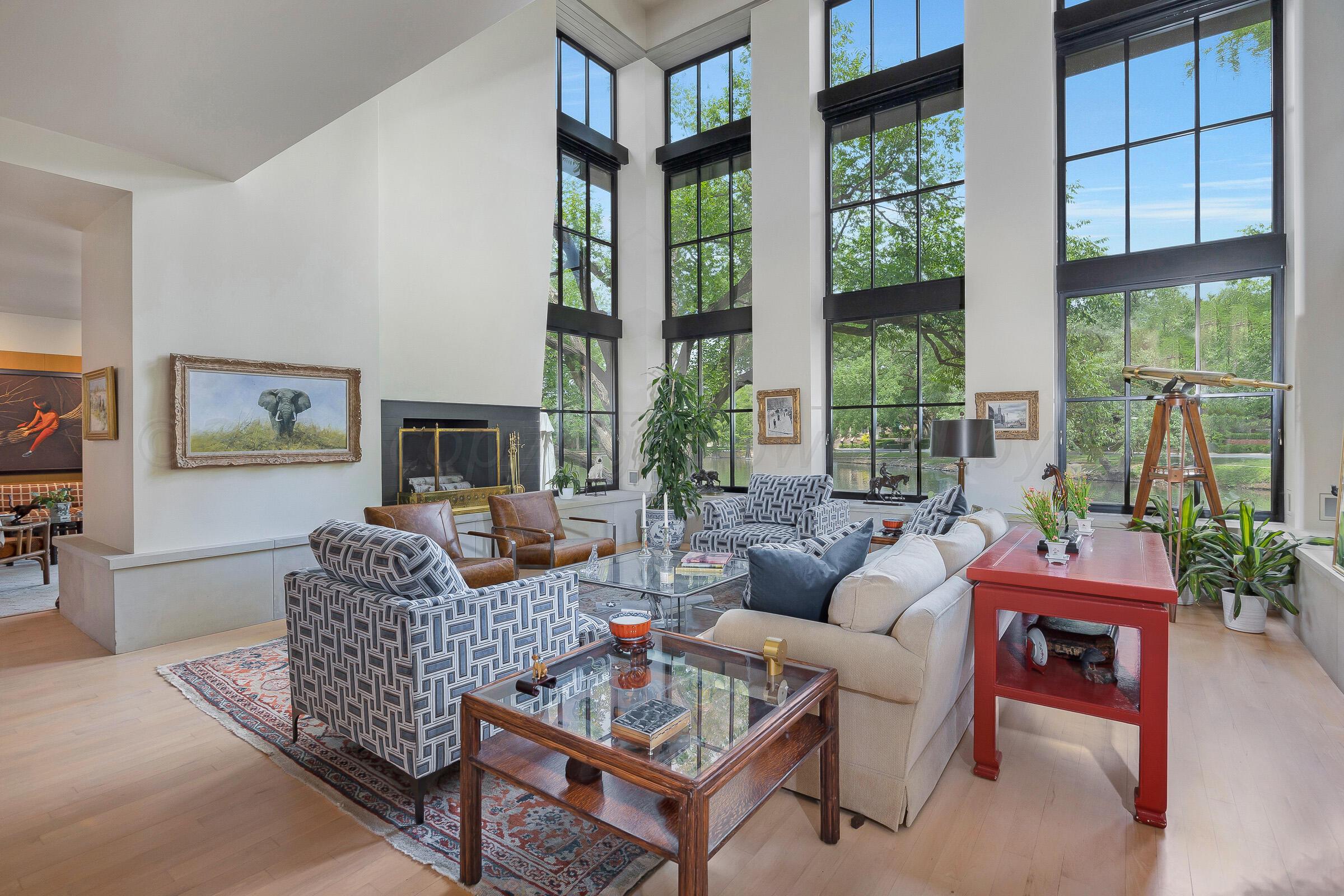 2 Edgewater Drive Amarillo, TX 79106 - Photo 3 of 51 a living room with furniture a large window and a table