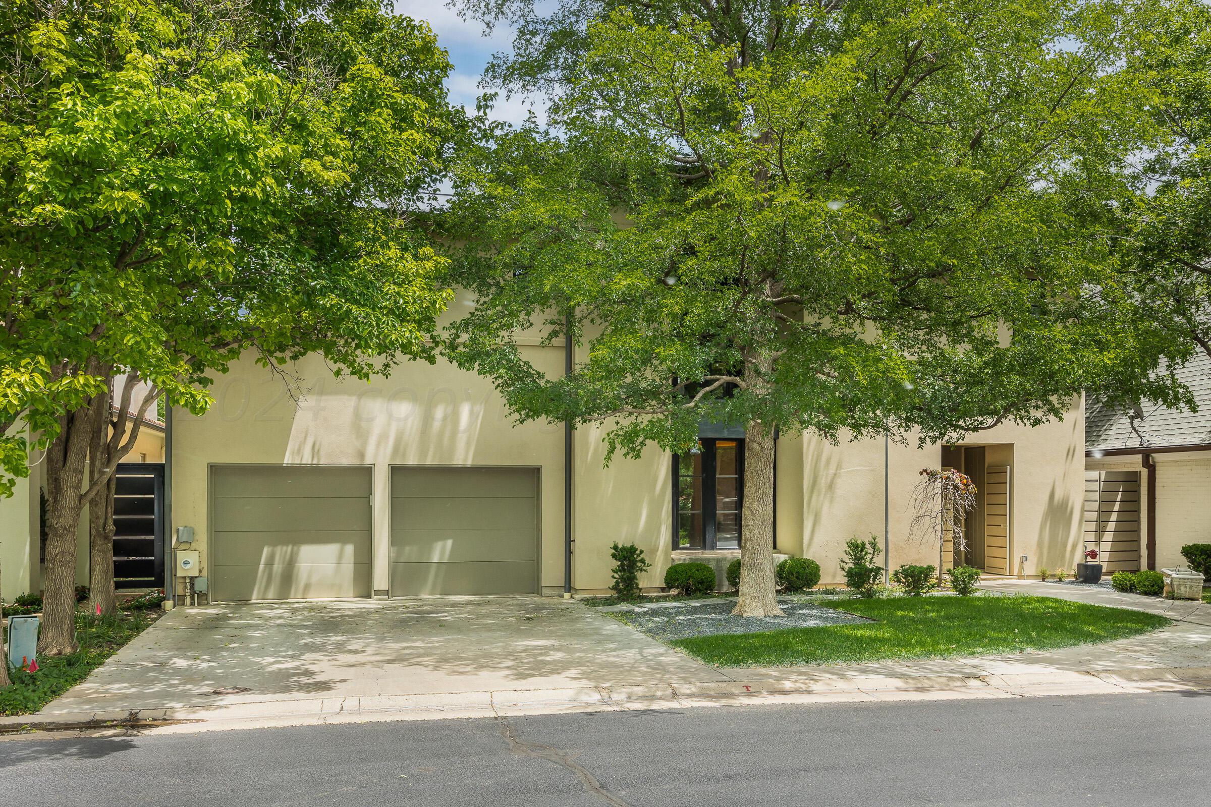 2 Edgewater Drive Amarillo, TX 79106 - Photo 45 of 51 a view of a house with a yard and large tree