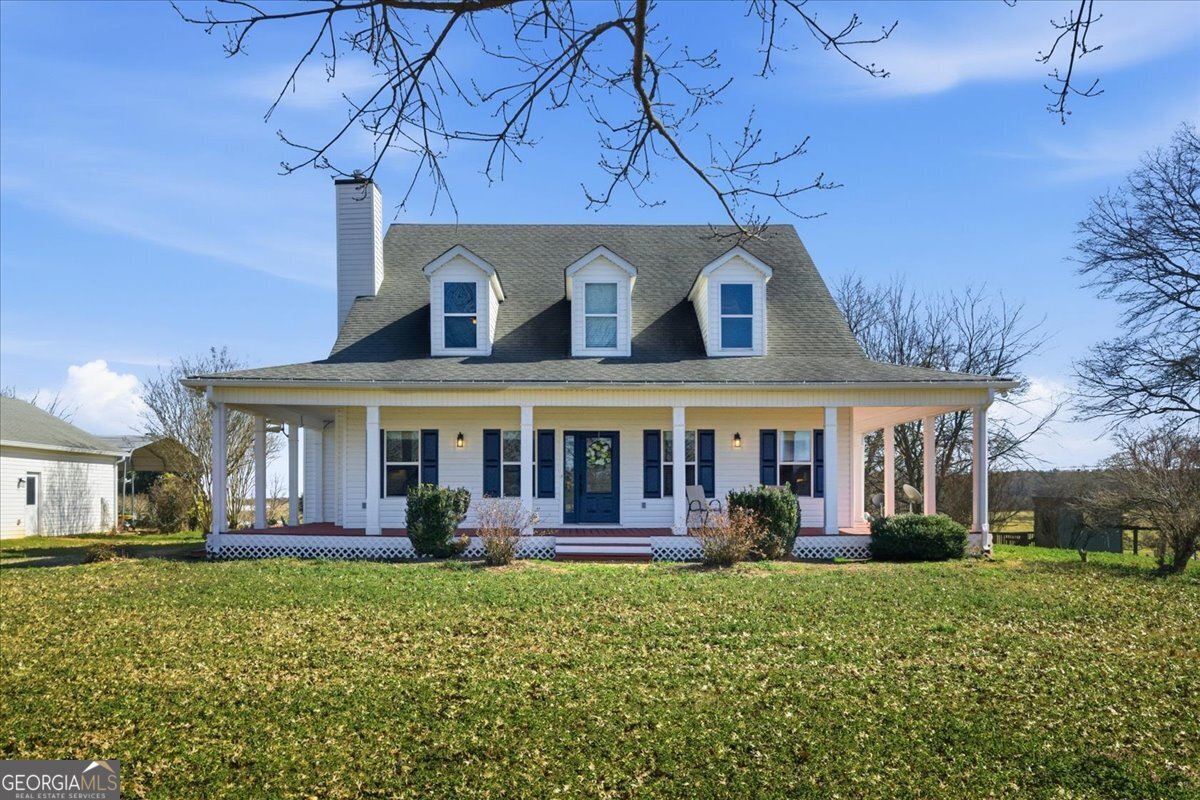 front view of a house with a yard