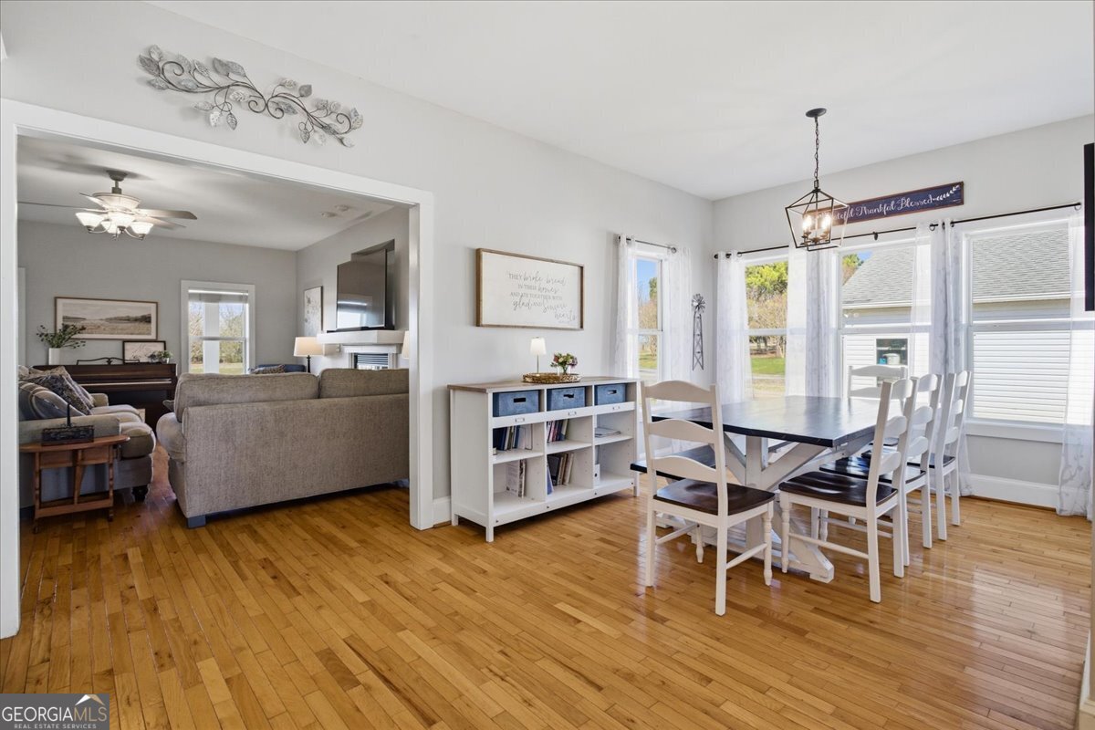 204 Staples Dairy Road Carrollton, GA 30116 - Photo 11 of 85 a living room with furniture and a wooden floor