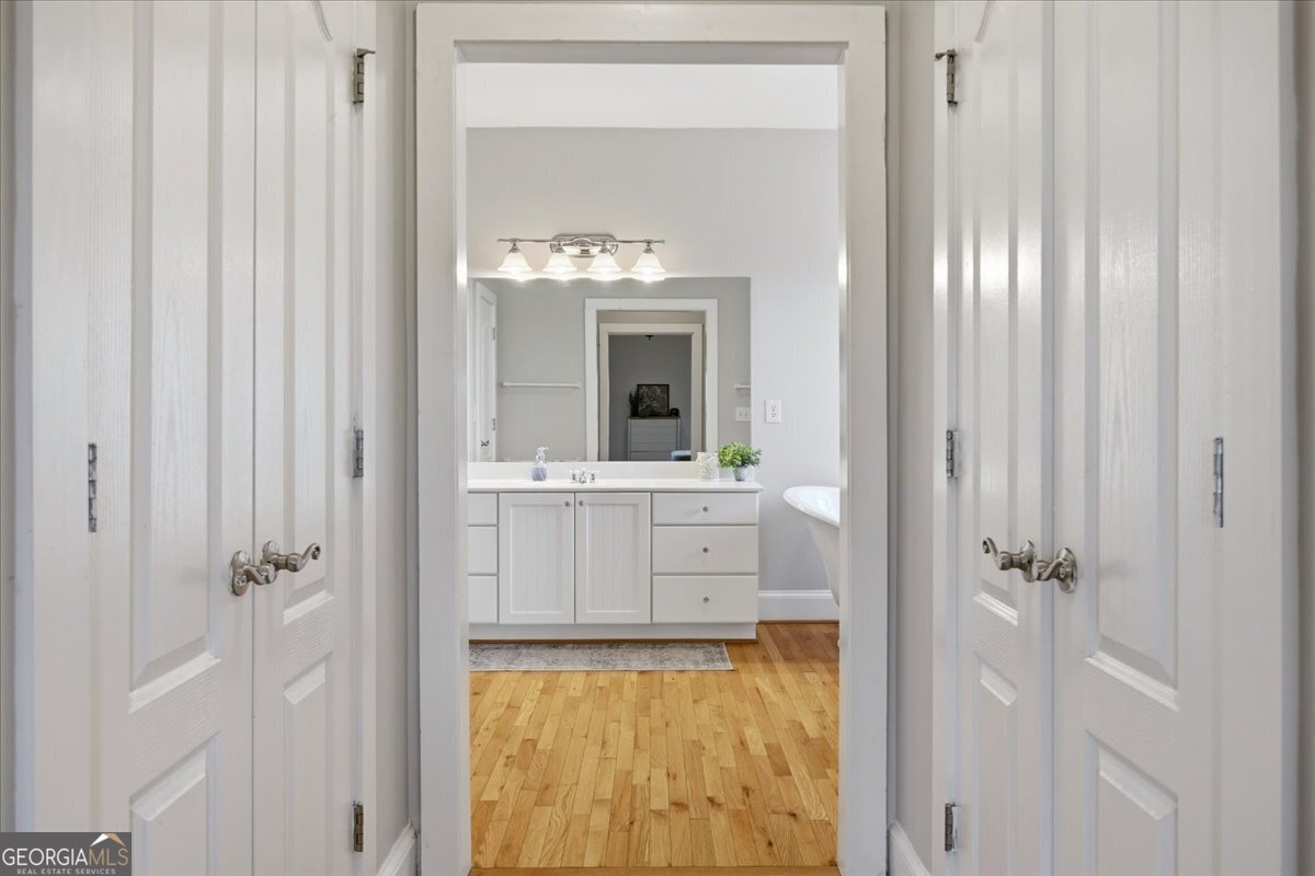 204 Staples Dairy Road Carrollton, GA 30116 - Photo 21 of 85 a bathroom with a sink and a mirror