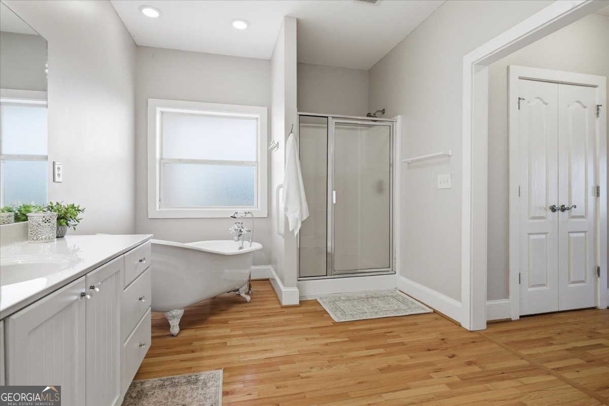 204 Staples Dairy Road Carrollton, GA 30116 - Photo 26 of 85 a bathroom with a sink and a mirror